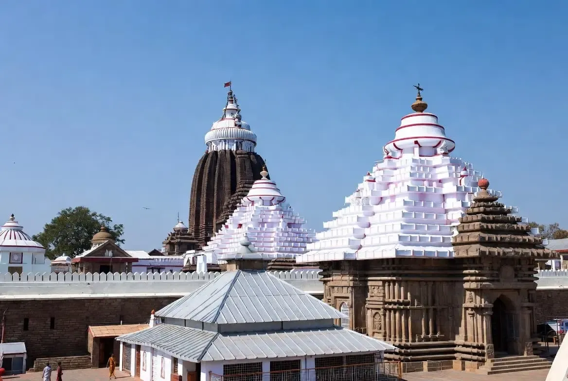 Jagannath Temple in Puri, Odisha, with its majestic structure rising above the coastal plain.